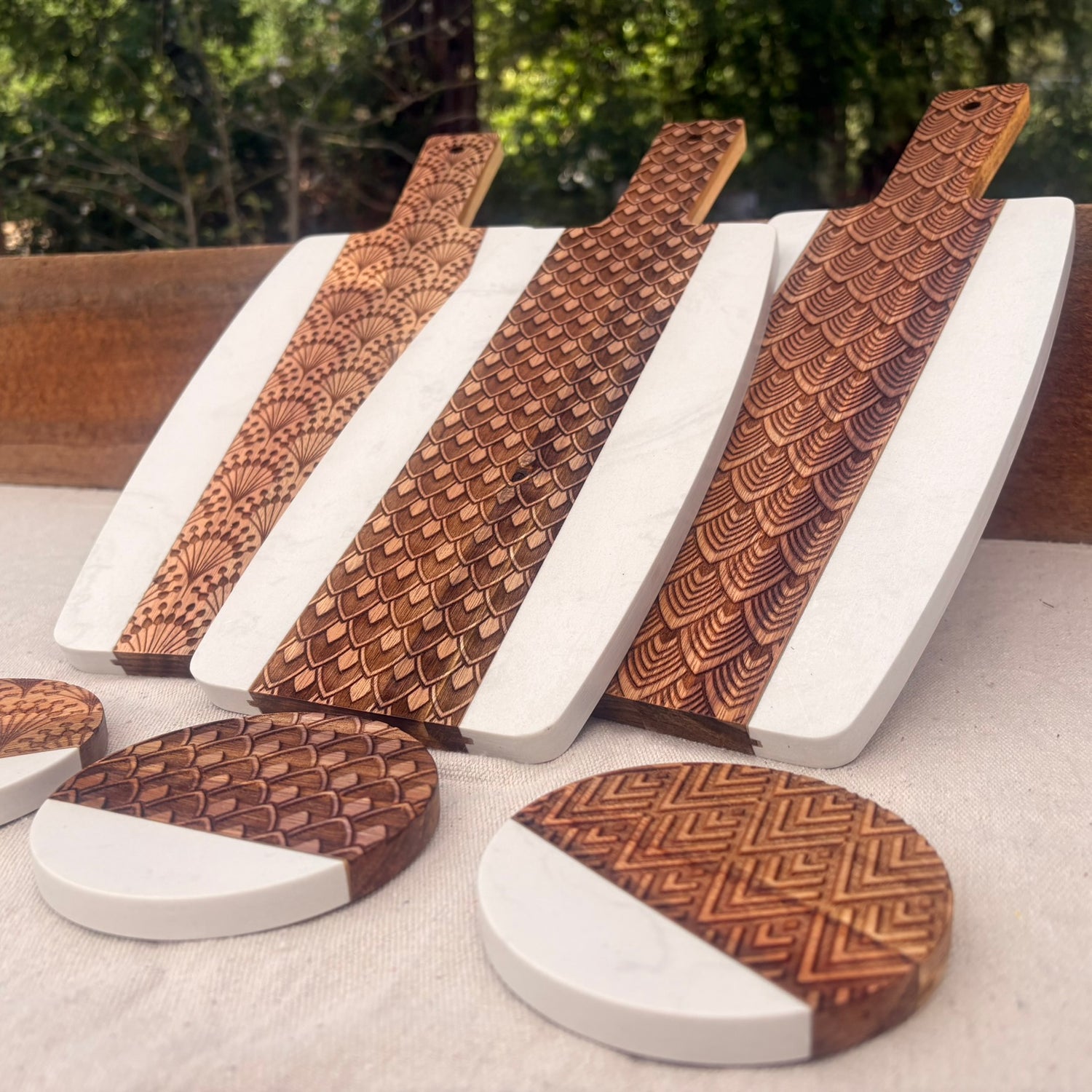 laser engraved marble and wood serving boards
